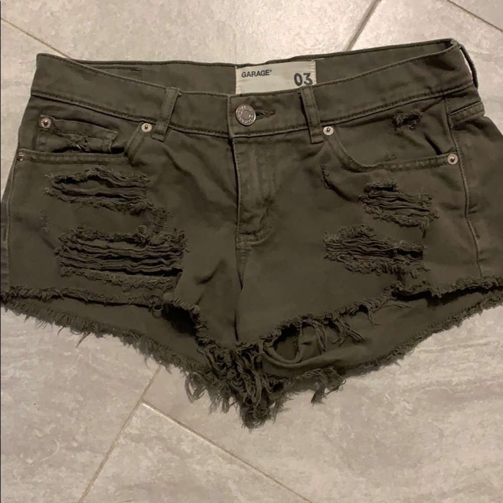 Distressed olive green short shorts